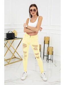 Skinny jeans s trháním ve žluté barvě