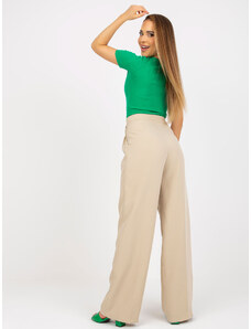 Fashionhunters Béžové široké kalhoty z látky s kapsami