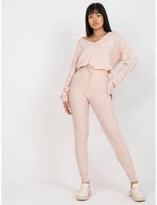 Fashionhunters Světle růžové dámské pletené kalhoty s vázačkou