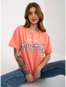 Fashionhunters Broskvové volné dámské tričko s nápisem