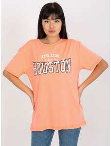 Fashionhunters Fluo oranžové volné dámské tričko s nápisem