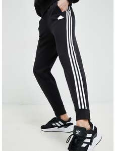 Tepláky adidas černá barva, s aplikací