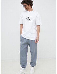 Tepláky Calvin Klein Jeans šedá barva, s aplikací