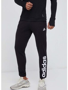 Tréninkové kalhoty adidas černá barva, s potiskem