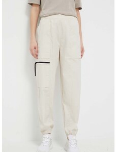 Kalhoty New Balance dámské, béžová barva