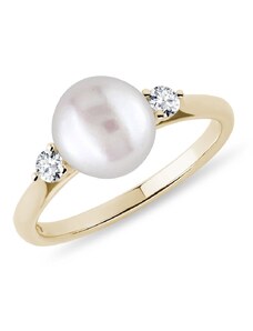 Zlatý prsten se sladkovodní perlou a brilianty KLENOTA R0673003