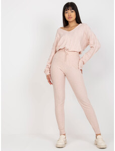 Fashionhunters Světle růžové dámské pletené kalhoty s vázačkou