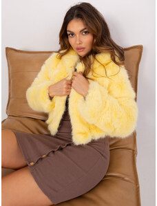 Fashionhunters Světle žlutá krátká dámská bunda s vsadkami z ekokůže