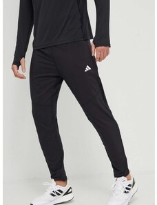 Běžecké kalhoty adidas Performance Own the Run černá barva, s potiskem, IK5024
