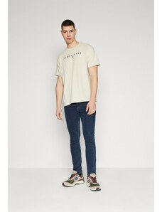 Tommy Jeans pánské béžové tričko LINEAR LOGO