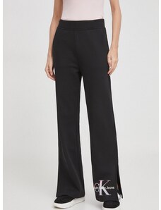 Bavlněné tepláky Calvin Klein Jeans černá barva, s potiskem, J20J223422