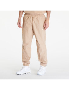 Pánské šusťákové kalhoty Nike x NOCTA Woven Track Pants Hemp/ Sanddrift