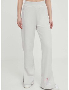 Bavlněné tepláky Calvin Klein Jeans šedá barva, s potiskem