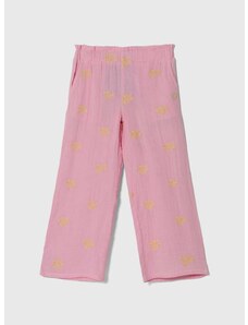 Dětské bavlněné kalhoty Guess růžová barva, vzorované