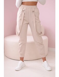 MladaModa Stylové kalhoty s ozdobnými popruhy model 6758 béžové