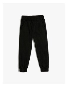 Koton Basic Jogger Trousers. Textured, elastic waist, pockets.