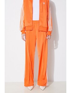 Tepláky adidas Originals oranžová barva, s aplikací, IP0640