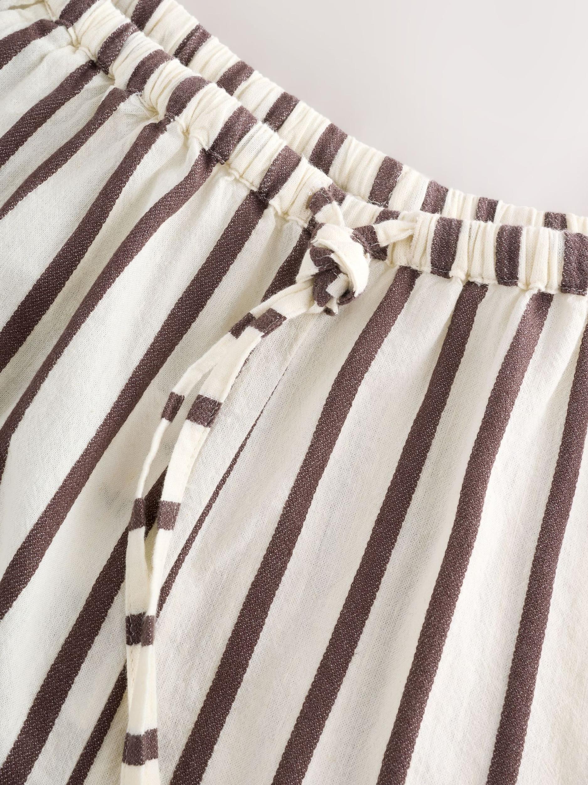 Next Kalhoty světle béžová / čokoládová