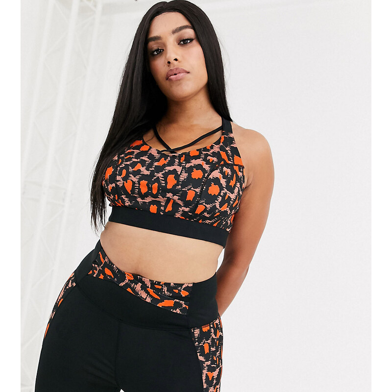 Wolf & Whistle curve leopard print sports bra with cross detail