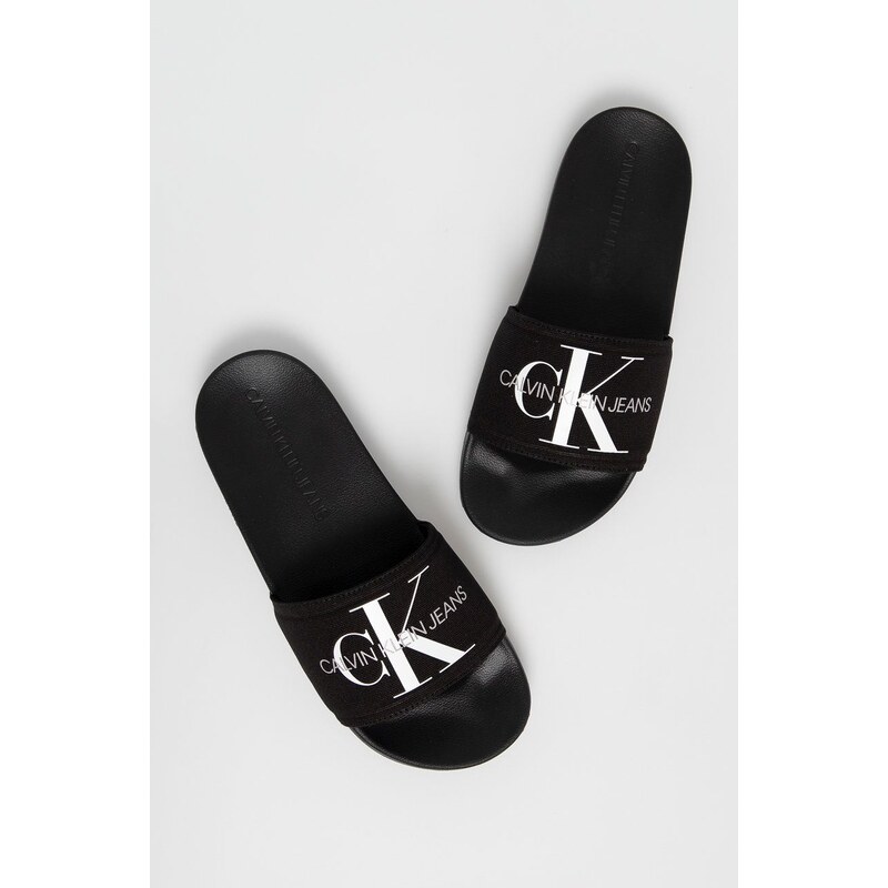 Pantofle Calvin Klein Jeans SLIDE MONOGRAM CO pánské, černá barva, YM0YM00061