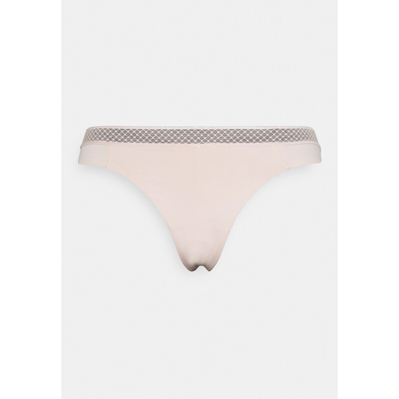 Dámské tanga QF6307E - TRN - Pudrová - Calvin Klein 74066384