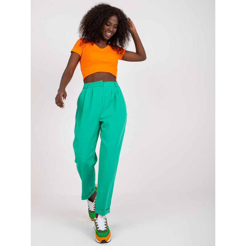 Fashionhunters Zelené dámské kalhoty z látky s kapsami RUE PARIS
