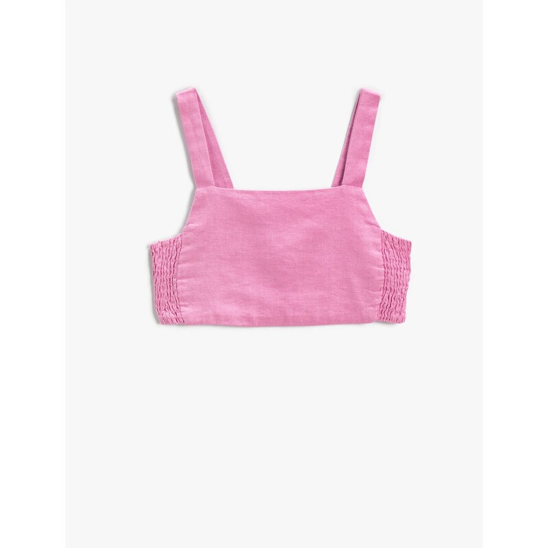 Koton A crop top with thick straps and a window detail in the back with elastication.