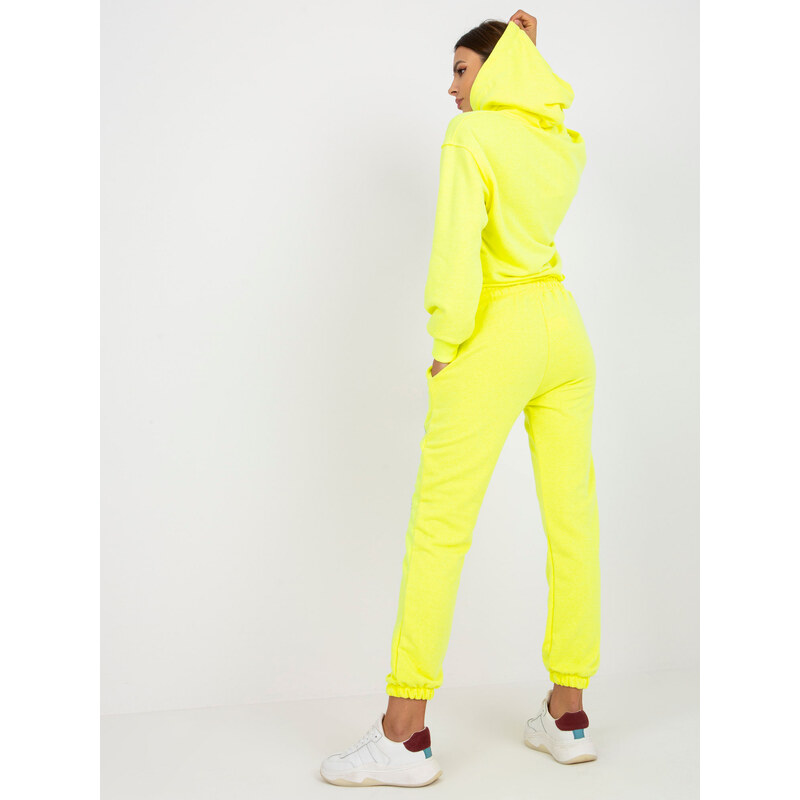 Fashionhunters Fluo žlutá dvoudílná mikinová souprava s potiskem