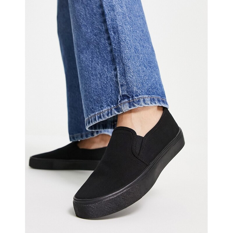 ASOS DESIGN Dotty slip on plimsolls in black 115509555