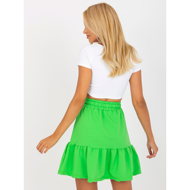 Fashionhunters Světle zelená krátká mikinová sukně s detailem zavazování