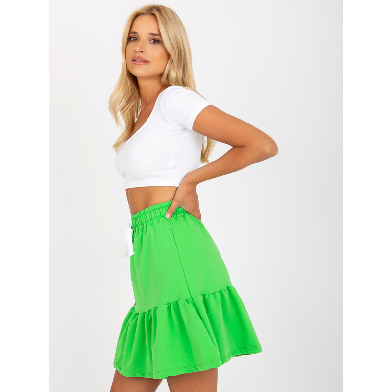 Fashionhunters Světle zelená krátká mikinová sukně s detailem zavazování
