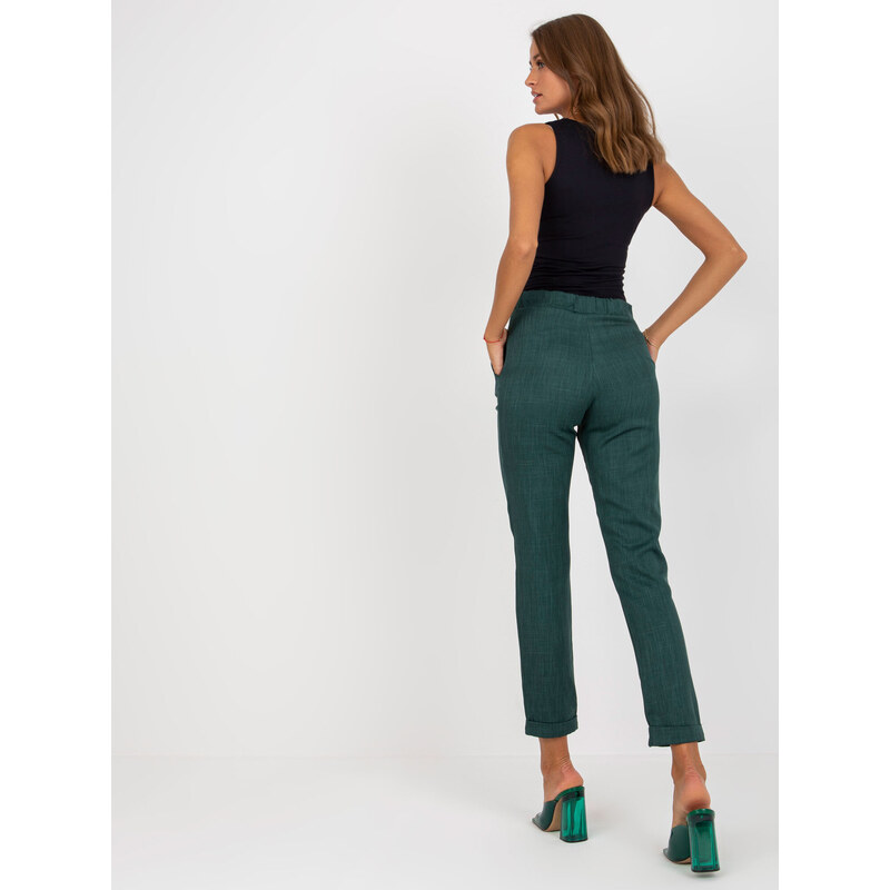 Fashionhunters Tmavě zelené dámské látkové kalhoty
