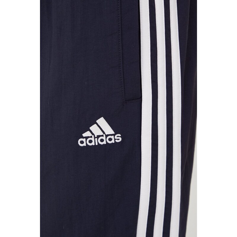 Tepláky adidas Essentials dámské, tmavomodrá barva, vzorované