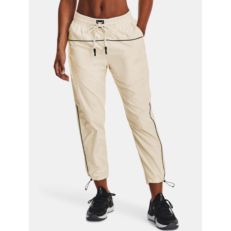 Krémové dámské kalhoty Under Armour 115658960