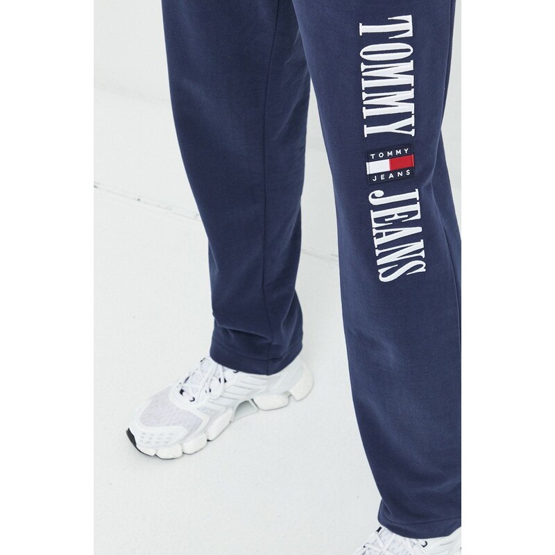 Bavlněné tepláky Tommy Jeans tmavomodrá barva, s aplikací