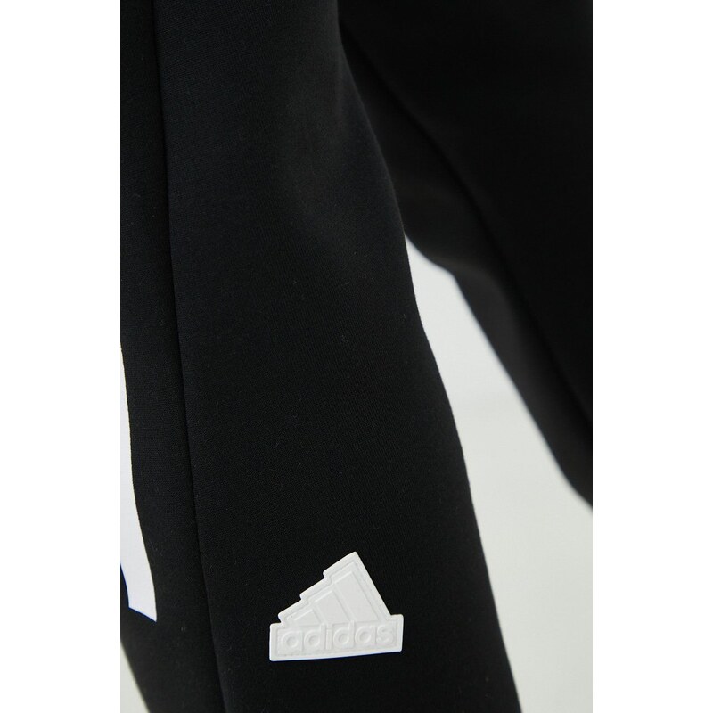 Tepláky adidas pánské, černá barva, s potiskem