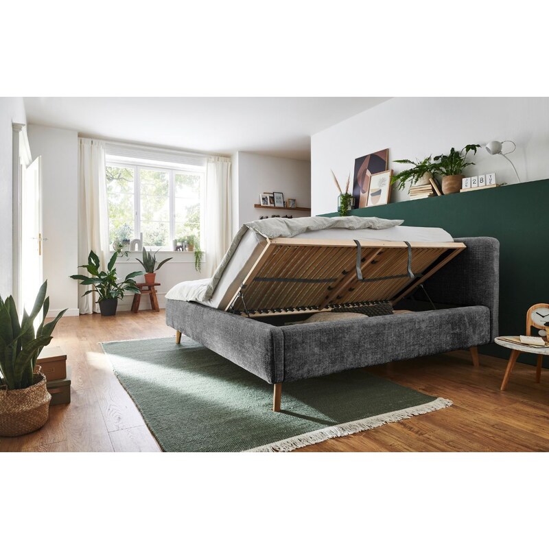 Antracitově šedá látková dvoulůžková postel Meise Möbel Mattis 180 x 200 cm s úložným prostorem