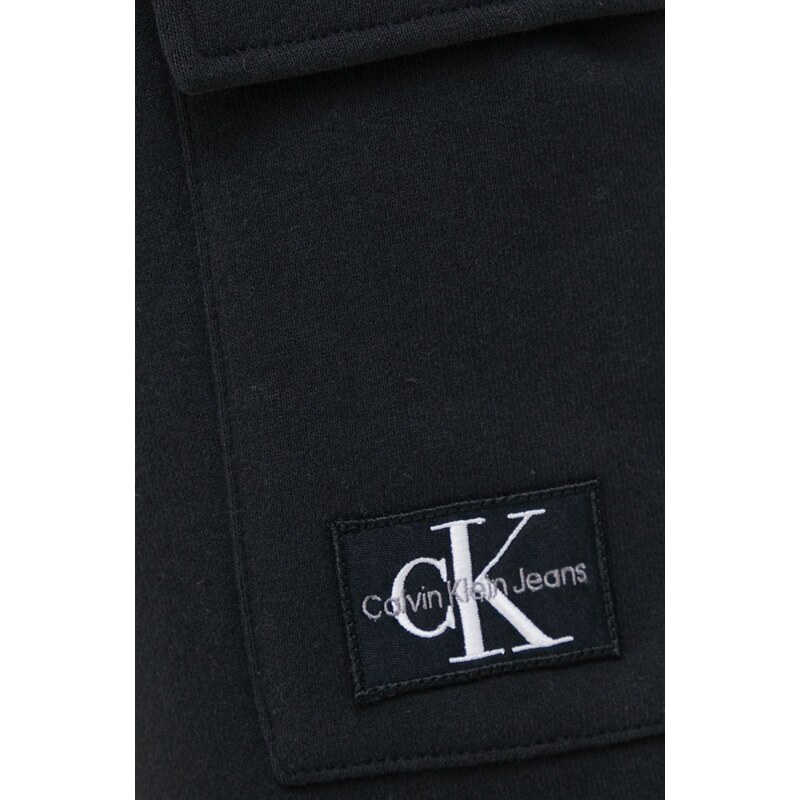 Bavlněné tepláky Calvin Klein Jeans černá barva
