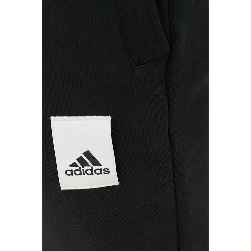 Tepláky adidas černá barva, s aplikací