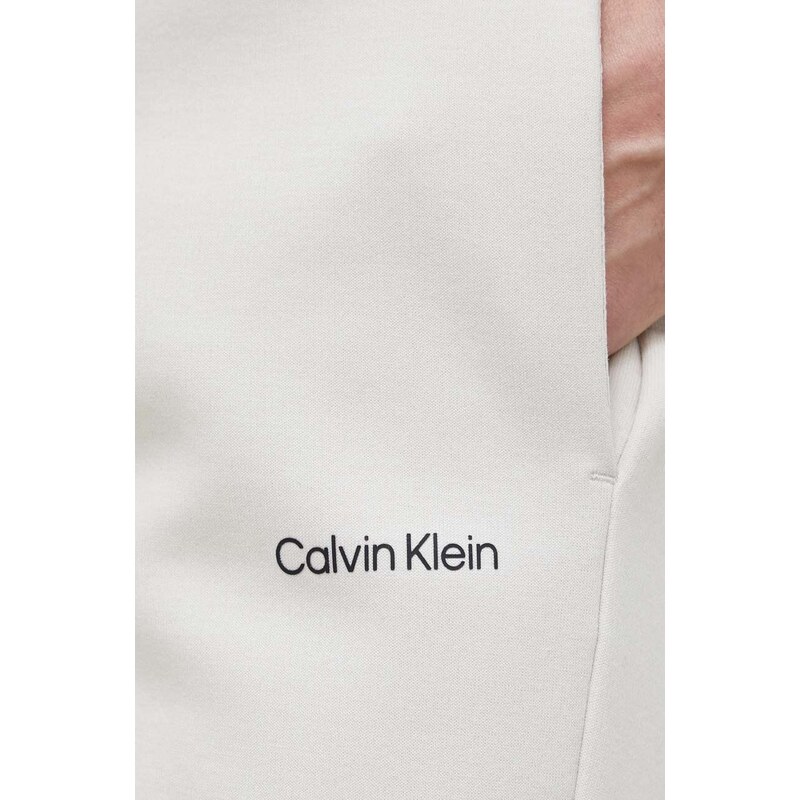 Tepláky Calvin Klein pánské, béžová barva, hladké
