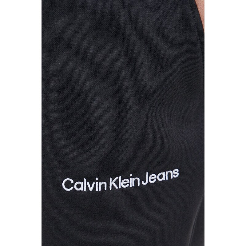 Tepláky Calvin Klein Jeans černá barva, s aplikací