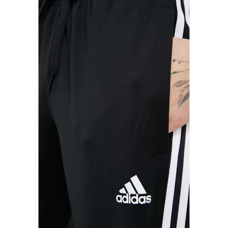 Tepláky adidas černá barva, s aplikací