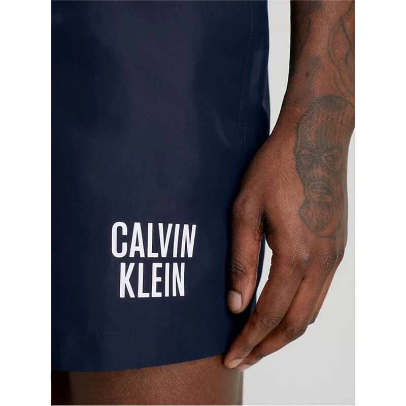 Tmavě modré pánské plavky Calvin Klein Underwear - Pánské