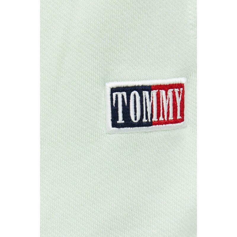 Bavlněné tepláky Tommy Jeans zelená barva, s aplikací