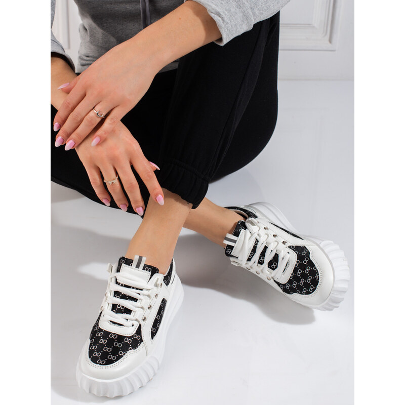 Bílá dámská sportovní obuv Shelvt s černými vložkami