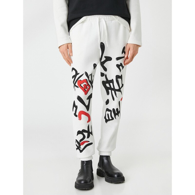 Koton Asian Print Jogger Sweatpants with a drawstring waist and pockets.