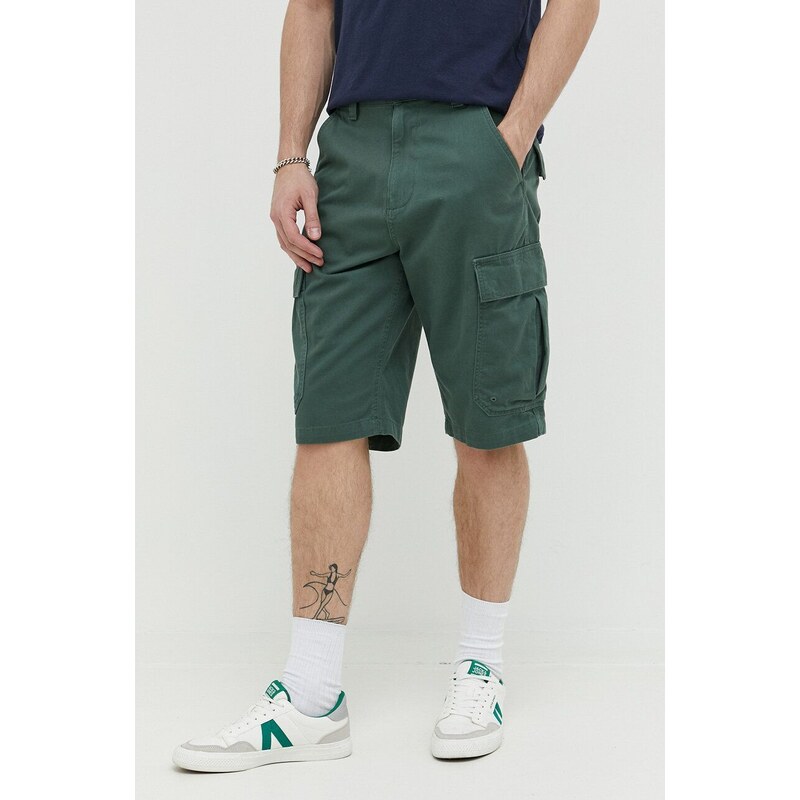 Bavlněné šortky Tommy Jeans zelená barva