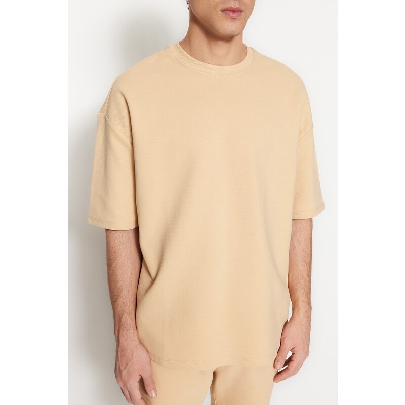 Trendyol Limitovaná edice béžová oversize 100% bavlna označená texturou Basic Thick T-Shirt