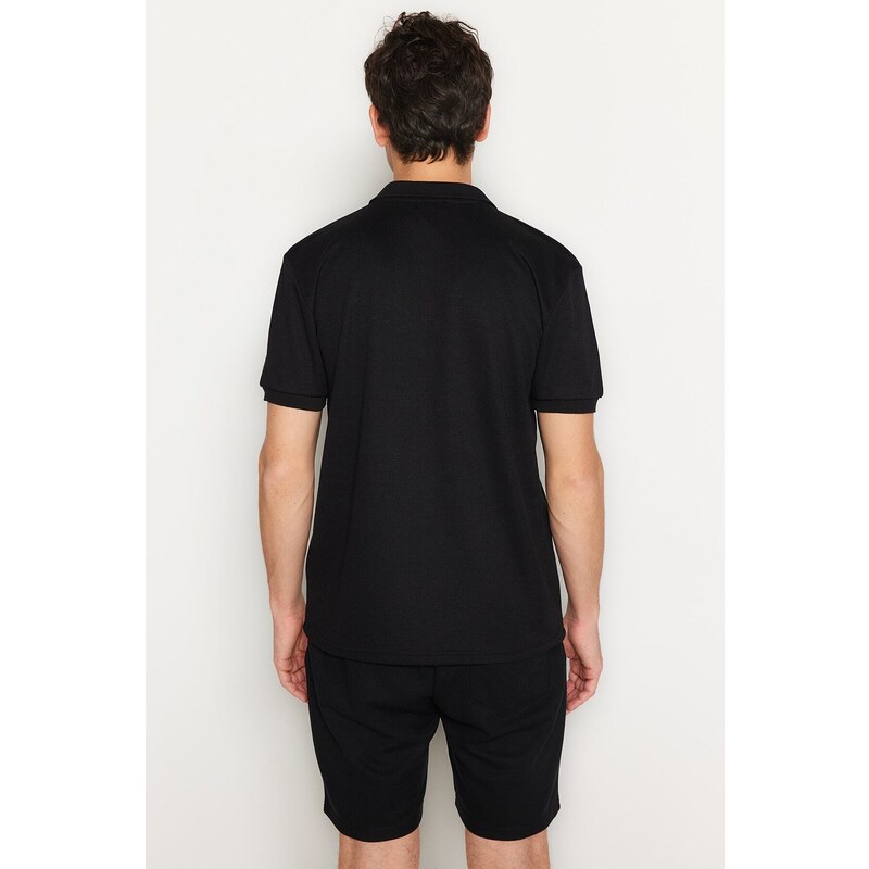 Trendyol Black Regular/Regular Fit Short Sleeve Label Appliqué Polo Neck T-shirt