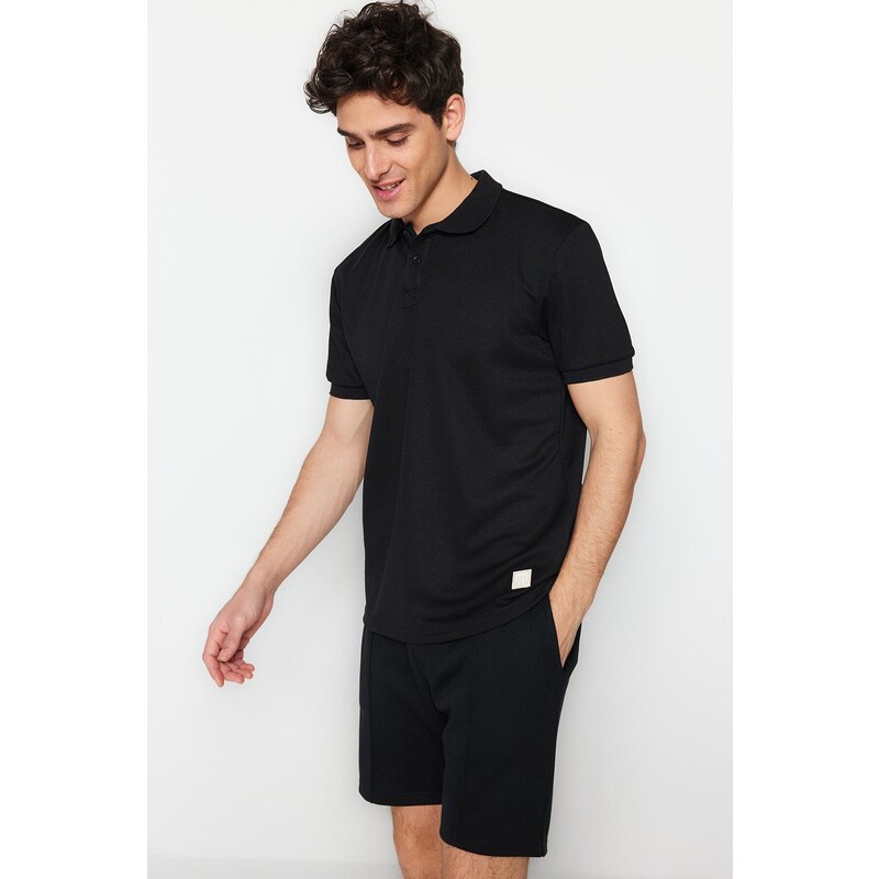 Trendyol Black Regular/Regular Fit Short Sleeve Label Appliqué Polo Neck T-shirt